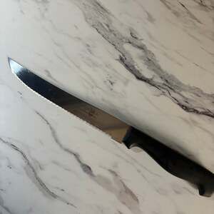 Tramontina 8-Inch Serrated Bread and Slicing Knife with Black Plastic Handle